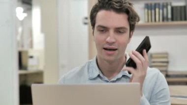 Creative Man Talking on Phone, Discussing Project