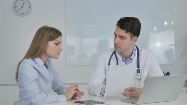 Doctor Sharing Good News Patient Holding Medical Report — Wideo stockowe