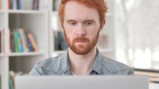 Close Up of Casual Redhead Man Working on Laptop — Stok Video