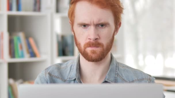 Thumbs Down by Casual Redhead Man Looking at Camera at Work — Stok Video