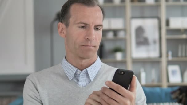 Portrait of Middle Aged Man Busy Using Smartphone — Stock Video