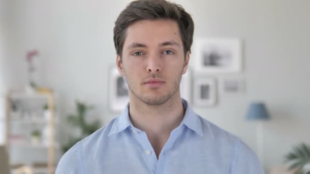 Portrait of Serious Handsome Young Man Looking at Camera — Stock Video
