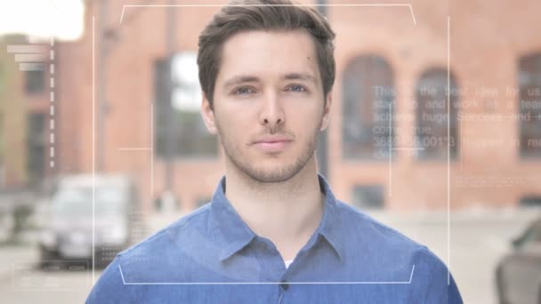 Identificación de hombre joven por sistema de escaneo de reconocimiento facial biométrico — Vídeos de Stock