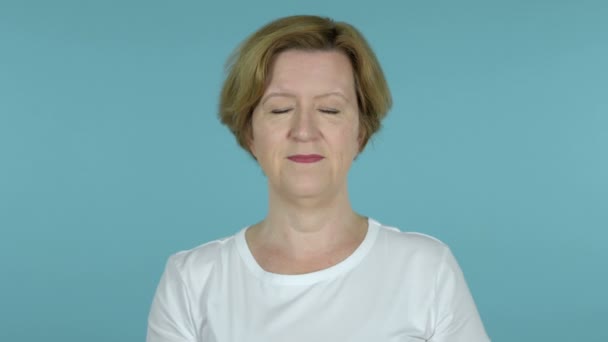 Happy Amazed Old Woman Surprised by Gift Isolated on Blue Background — Stock Video