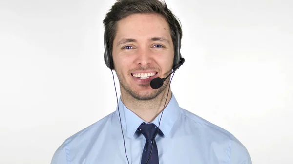 Sorrindo jovem Call Center Agente em fundo branco — Fotografia de Stock