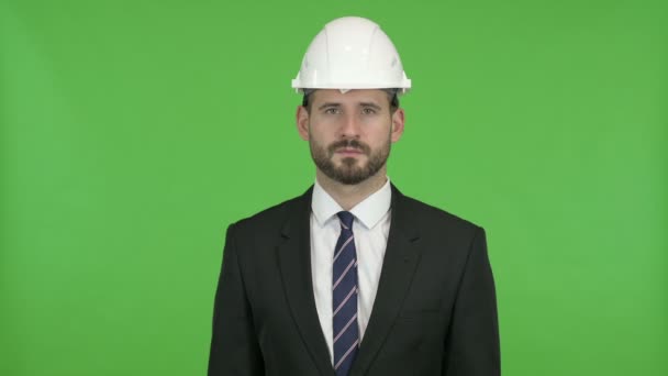 Young Engineer looking in Camera against Chroma Key — Stock Video