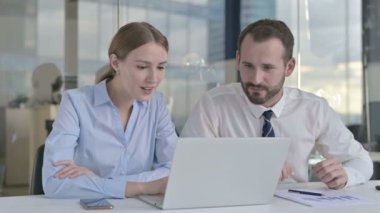 Executive Business people Surprised in Office while Working on Laptop