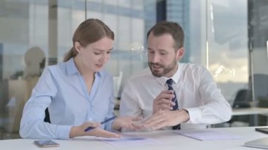 Executive Business people having Arguments on Documents in Office