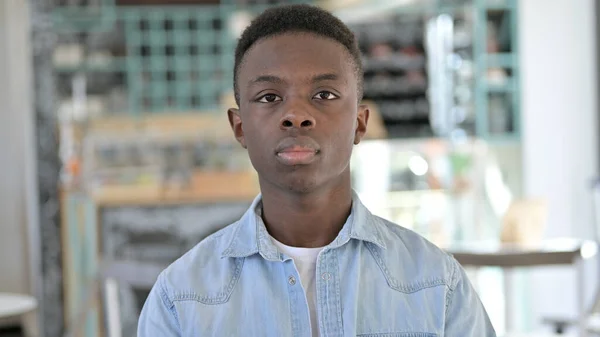 Portrait of Serious Young African Man Looking at Camera — Stock Photo, Image