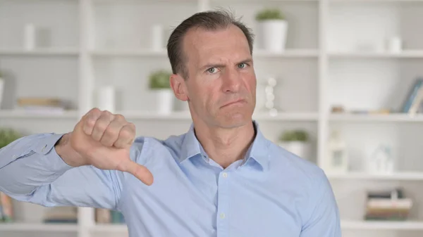 Portrait of Unhappy Middle Aged Businessman showing Thumbs Down — Stock Photo, Image