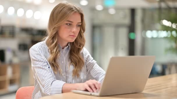 Businesswoman with Laptop Looking at Camera — Stock Video