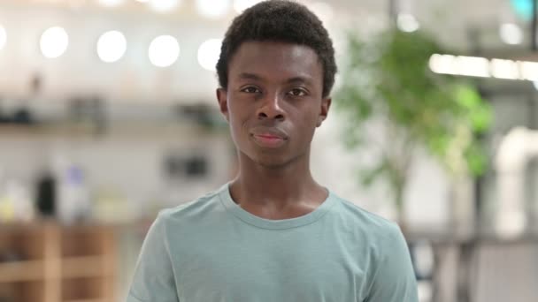 Portrait of Disappointed Young African Man doing Thumbs Down — Stock Video