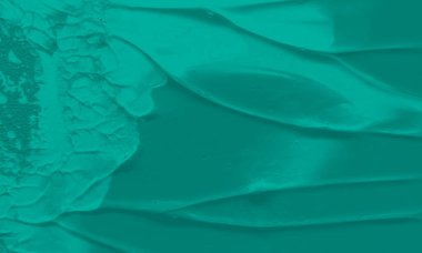 Zümrüt renkli soyut bir akrilik tablo. Tuval üzerine yağlı boya boya. Renk dokusu. Sanat eserinin bir parçası. Fırça darbeleri.