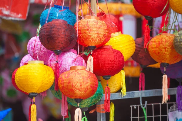 Hanoi / Vietnam - Sept. 1 2020: Traditional market sells colorful lanterns with different shapes, lion heads, drums... for the mid-autumn festival. The market is organized at Old Quarter, Hanoi.