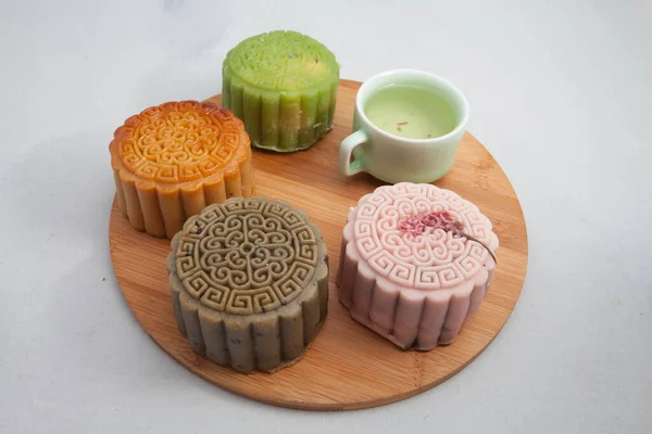 Vietnamese mid autumn festival cake. Mooncakes are traditional pastries eaten during the Mid-Autumn Festival. The festival involves family getting together to share mooncakes while watching the moon