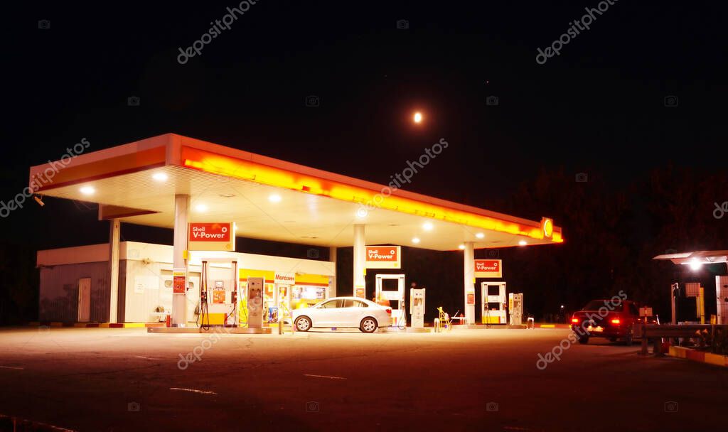 Khmelnytskyi, Ukraine - September 25, 2020: Shell gas filling station at night. The retail network of Shell gas stations in Ukraine.