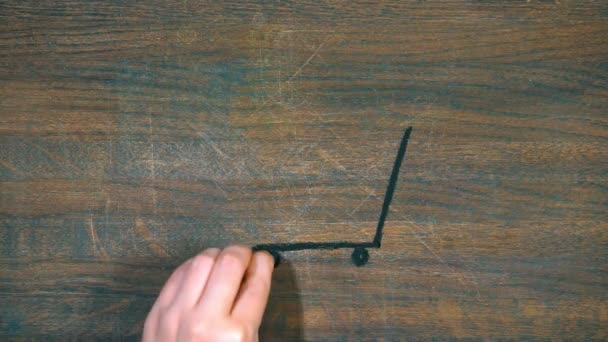 Closeup of hand draws on a wooden board. Drawing of a hand trolley with chalk. — Stock Video