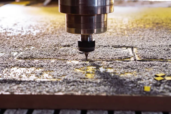 Turning and milling machine with CNC. The chip is on the surface of the workpiece.