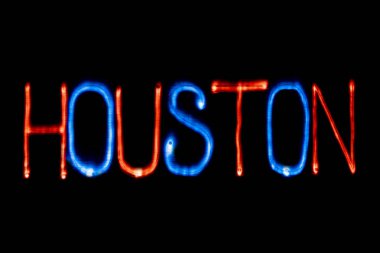 Işık boyama. Şehir adı. Houston. Mavi ve kırmızı renkler.