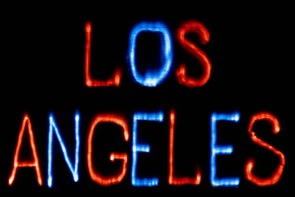 Pintura ligera. Nombre de la ciudad. LOS ÁNGELES. Colores azul y rojo . — Foto de Stock