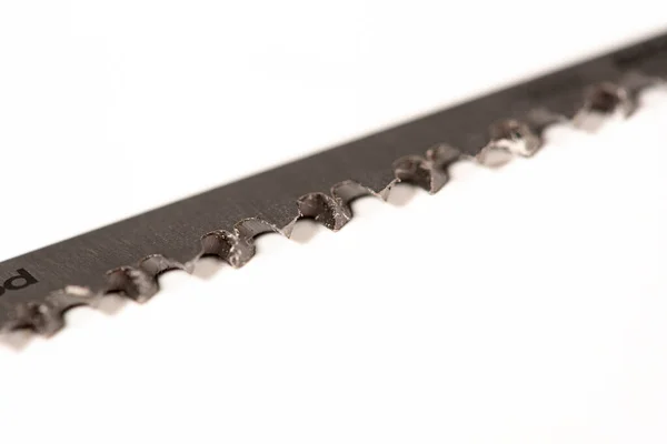 An image of jig saw blades. Macro — Stock Photo, Image