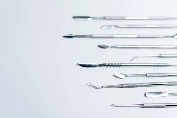 A set of manicure tools. Special sticks. There is an ad space on the left. — Stock Photo, Image