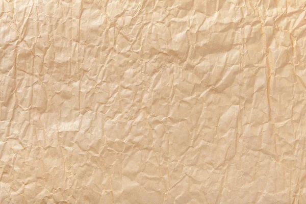 しわくちゃの茶色の包装紙 Closrup のテクスチャ ベージュの古い背景 — ストック写真