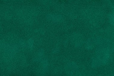 Koyu yeşil mat renkli süet kumaş, portre. Kadife sorunsuz derin zümrüt deri dokusuna. Materisl makro hissettim.