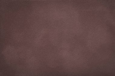 Süet kumaş, closeup koyu kahverengi mat zemin. Kadife skeç ile sorunsuz derin umber deri dokusuna. Materisl makro hissettim.