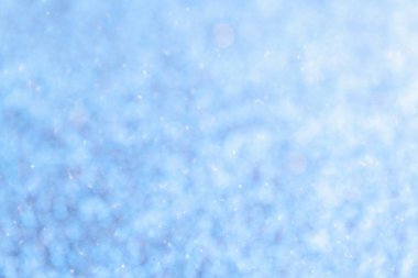 Daire parlak ışıklı Blye ve beyaz arka plan bulanık. Parlak ışıltılı bokeh Noel Garland. Koyu zemin