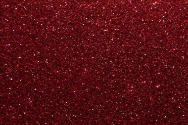 Koyu kırmızı parlak arka plan küçük payetler, portre. Tekstil gelen parlak parlak zemin. Şarap kağıt ışıltı