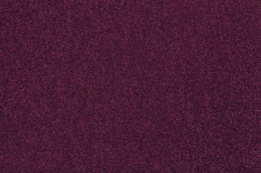 Dark purple matte background of suede fabric, closeup. Velvet texture of seamless wine woolen felt. clipart