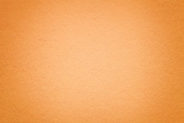 Skeç ile vintage koyu turuncu Kağıt arka plan doku. Yoğun ışık mercan kraft karton çerçeve ile yapısını. Degrade zemin closeup hissettim.