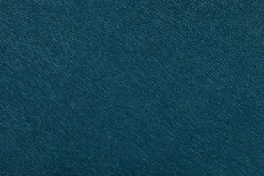 Dalgalı oluklu kağıt, closeup Lacivert arka plan dokusal. Buruşuk krep karanlık zümrüt karton makro yapısı.