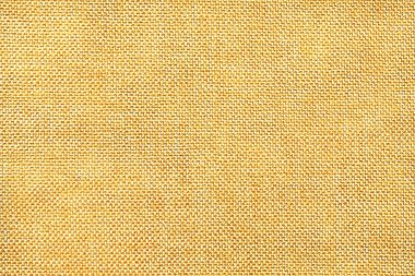 Açık sarı ve beyaz renkli yoğun dokuma kumaş, closeup torbalama. Doğal doku ile altın bez yapısı. Kumaş zemin.
