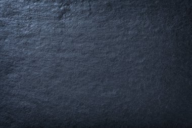 Donanma mavi arka planı. Taşın dokusu yakın plan. Grafik arkaplan makrosu