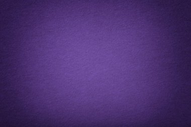 Koyu mor mat arka plan süet kumaş, portre. Kadife dokusuna skeç ile hissettim sorunsuz mor yün.