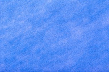 Lacivert bir arka plan yapısı ile keçe kumaş, closeup beyaz noktalar. Yün, ipek mat Tekstil doku. Kumaş zemin.