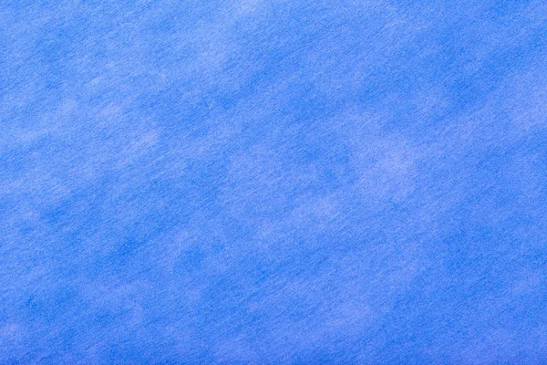 フェルト生地 クローズ アップの白の水玉ネイビー ブルー背景の構造 ウールのマット繊維の質感 布の背景 — ストック写真