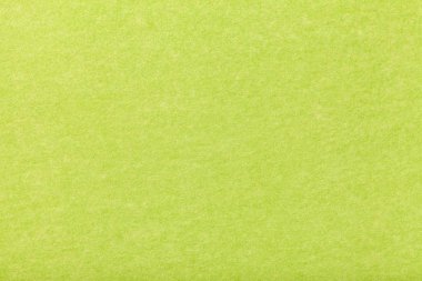 Açık yeşil mat renkli süet kumaş, portre. Kadife dokusuna hissettim kesintisiz zeytin yün.