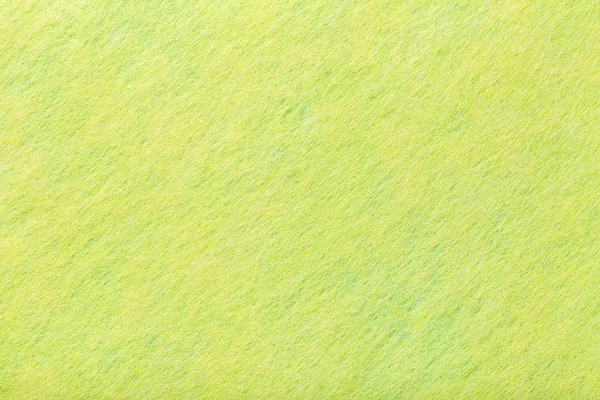 Light green matt suede fabric closeup. Velvet texture of felt. — Stock Photo, Image