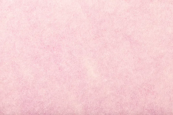 Luz rosa matt camurça tecido closeup. Textura de veludo de feltro . — Fotografia de Stock