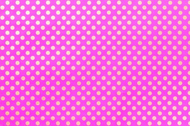 Polka nokta dolap bir desen ile ambalaj kağıdı açık mor arka plan.