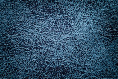 Bir yumuşak döşemelik Tekstil malzemesinden closeup lacivert arka plan.