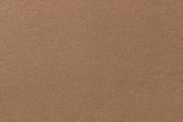 Licht bruin mat suède stof close-up. Fluwelen textuur van vilt. — Stockfoto
