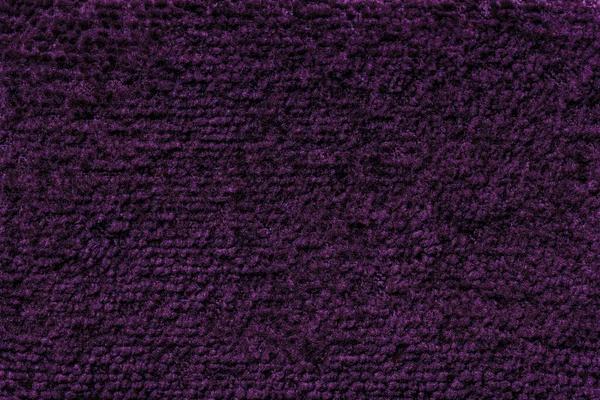 Fondo mullido púrpura oscuro de tela suave y suave. Textura del primer plano textil — Foto de Stock