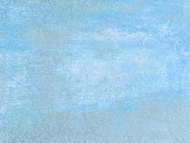 Eski mavi duvar eski püsksüz sıva ile kaplı.