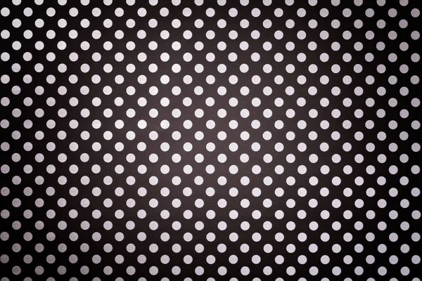 Черный фон из оберточной бумаги с рисунком белой горошек крупным планом . — стоковое фото