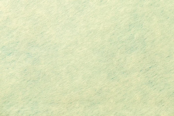 毛毡织物的浅绿色背景。羊毛纺织品的纹理 — 图库照片