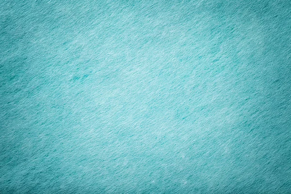 Açık mavi mat süet kumaş closeup. Keçe kadife doku.